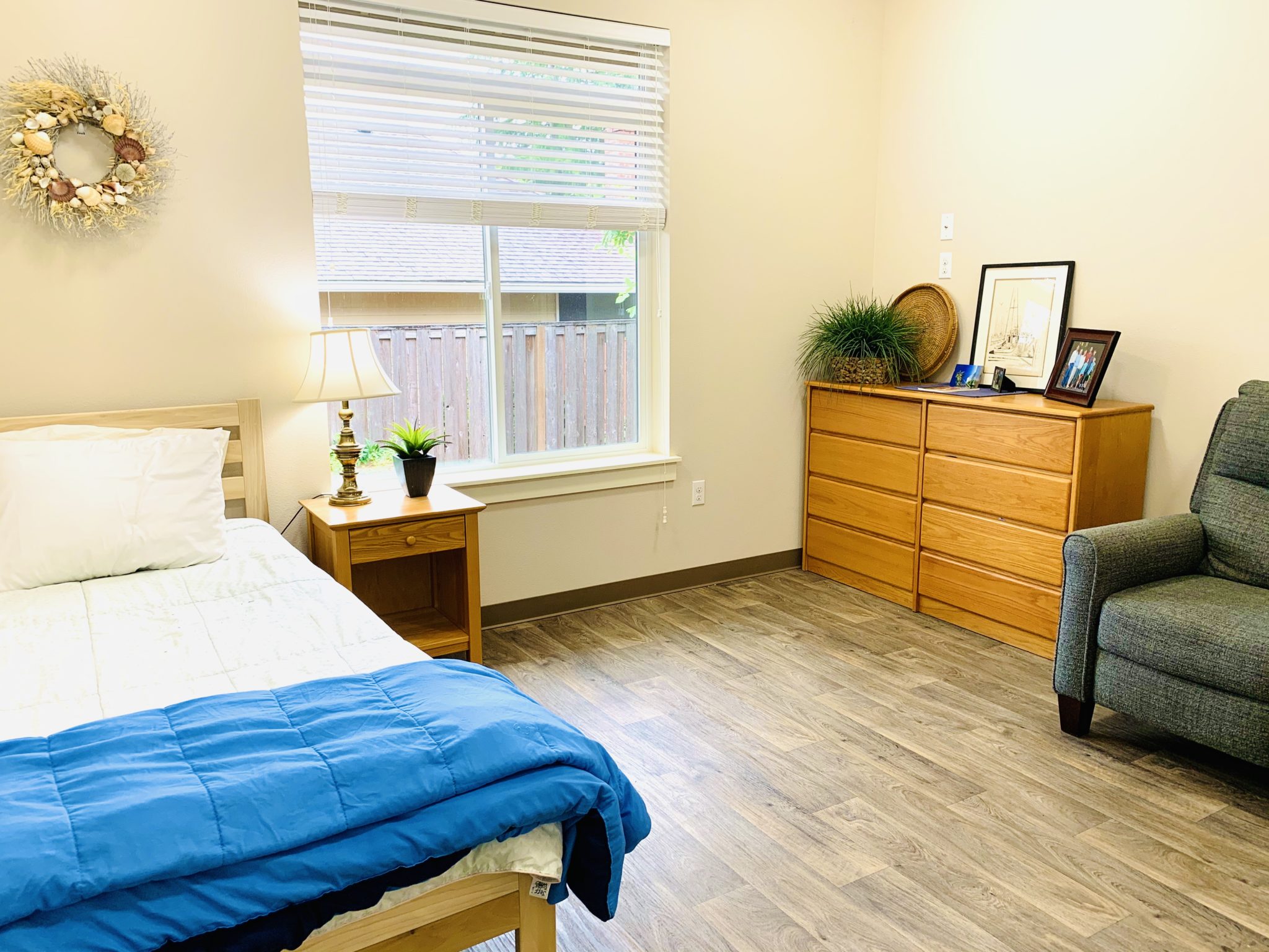warm, quiet memory care bedroom with soft natural lighting warm, quiet memory care bedroom with soft natural lighting