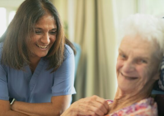 caregiver helping an older adult